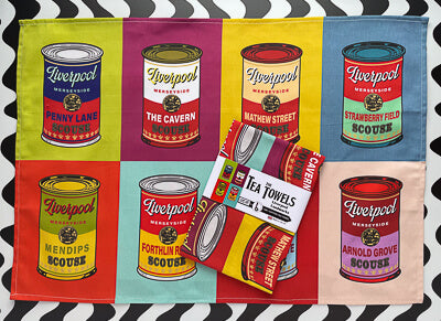 JONES ART X ISAAC’S BAZAAR SCOUSE CANS BEATLES EDIT TEA TOWEL