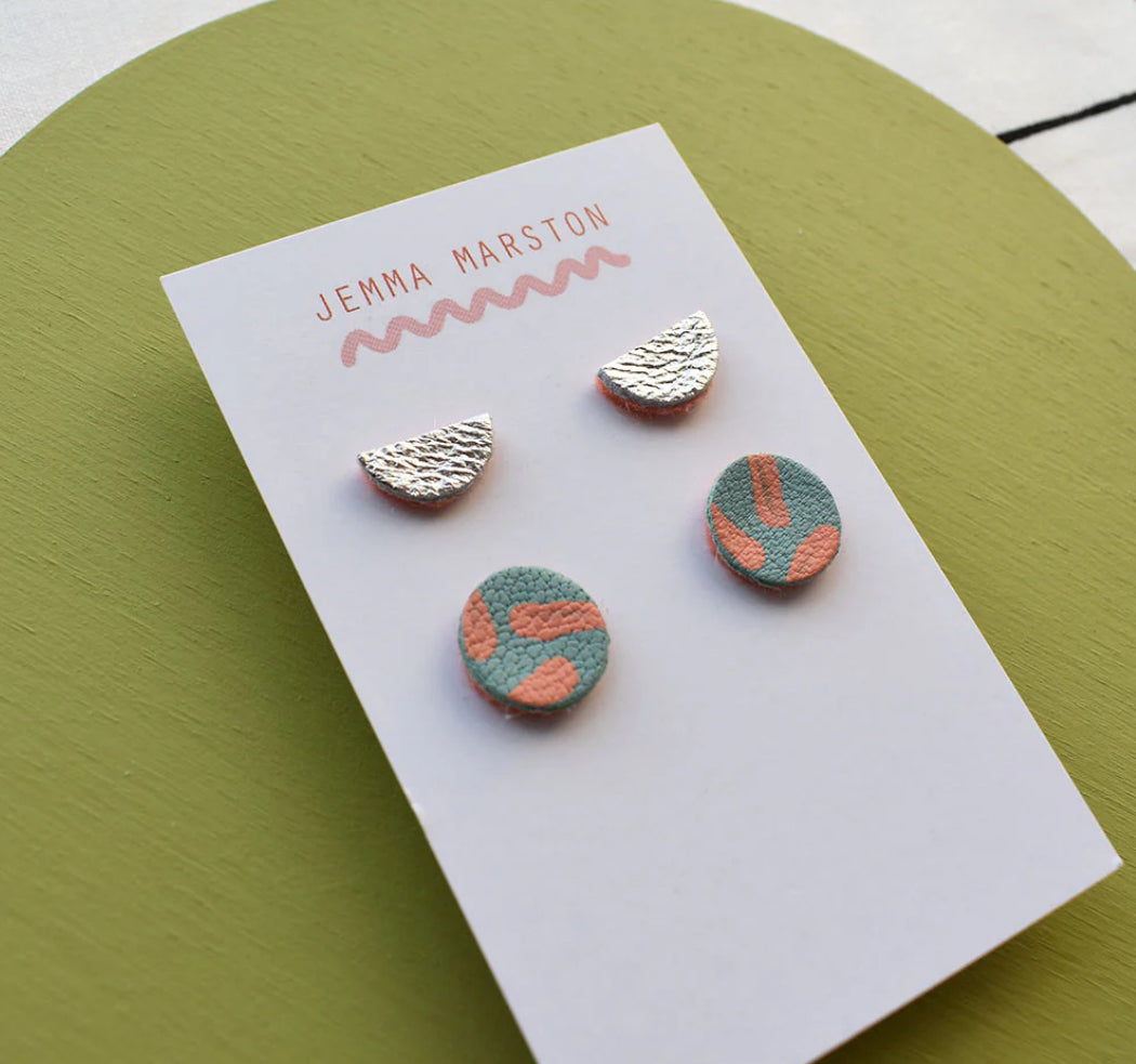 TWO SET OF LEATHER STUD EARRINGS