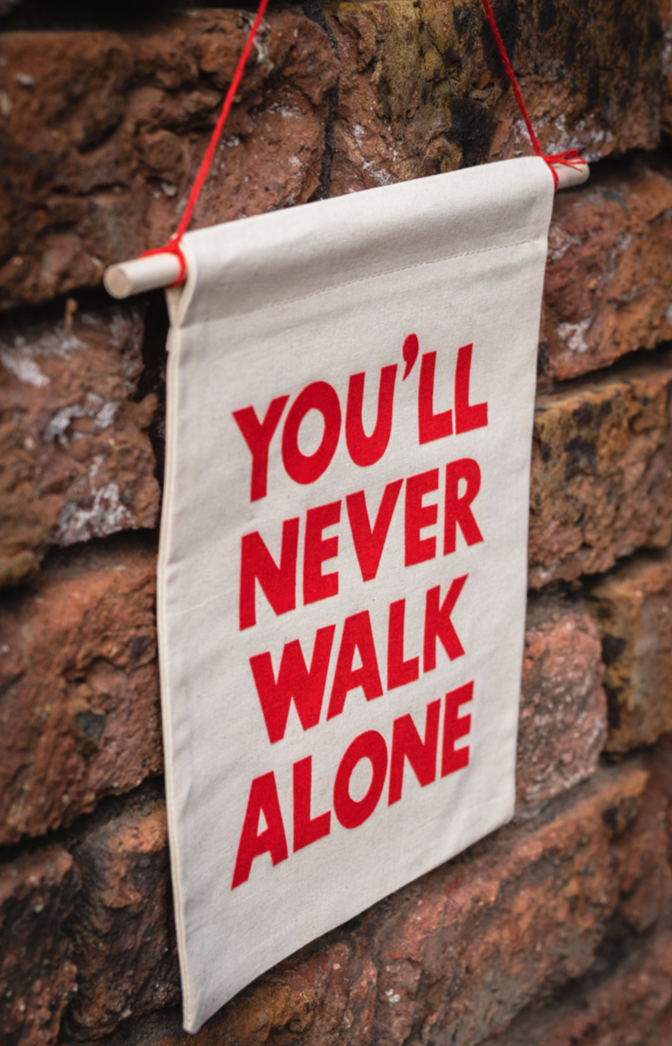 YOU'LL NEVER WALK ALONE